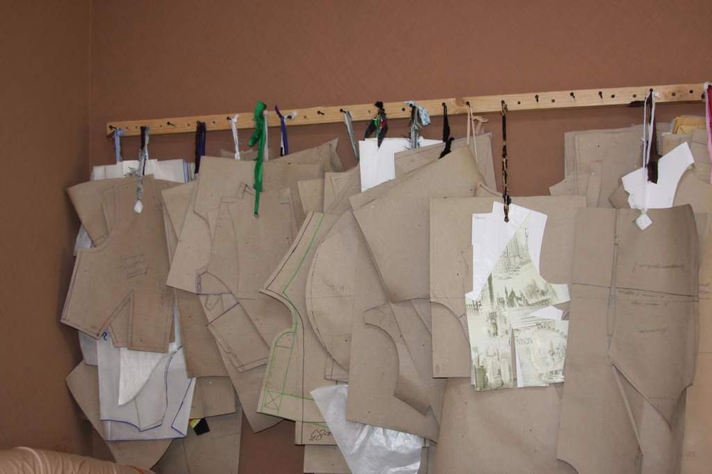 sewing patterns hanging on wall