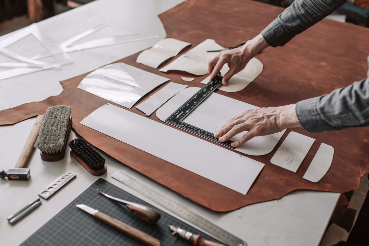 a person using a set square