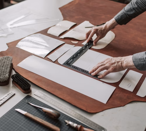 a person using a set square